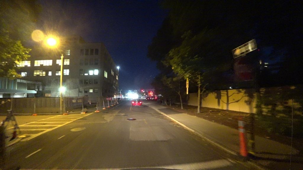 Street-level low light example from Brookline Longwood Fenway, cropped to show the local street context.