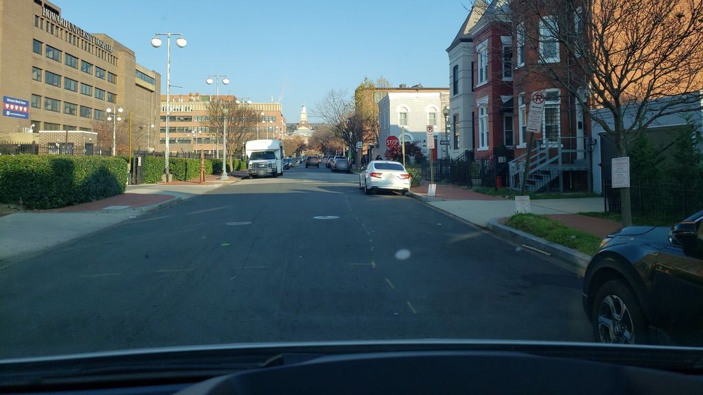 Street-level daytime example from Dupont Logan Circle Dc, cropped to show the local street context.