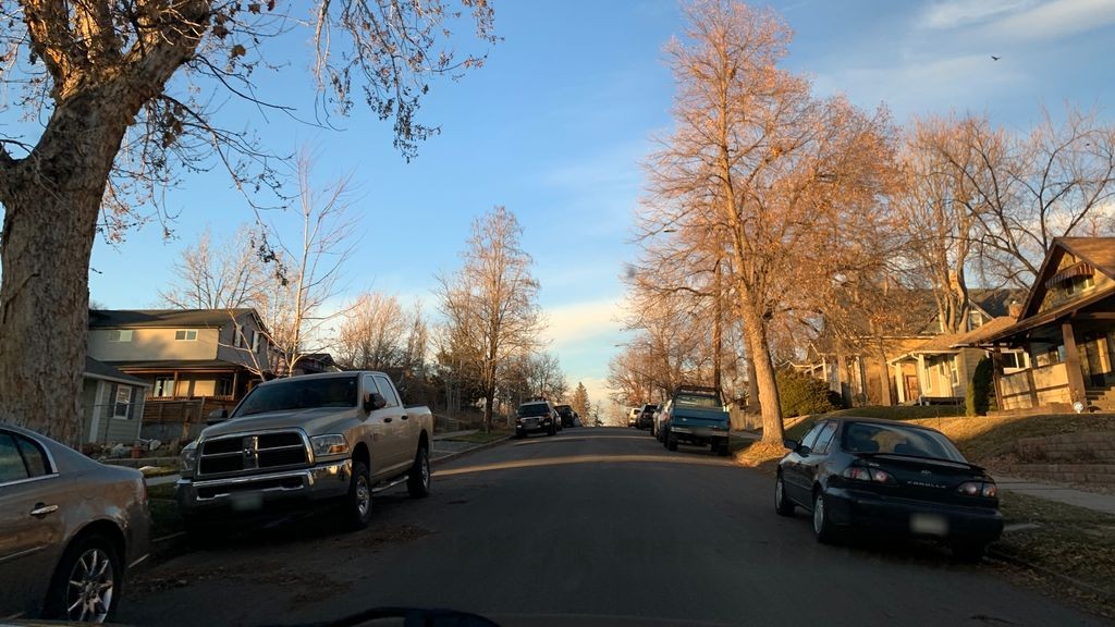Street-level daytime example from Highlands Sloans Lake Denver, cropped to show the local street context.