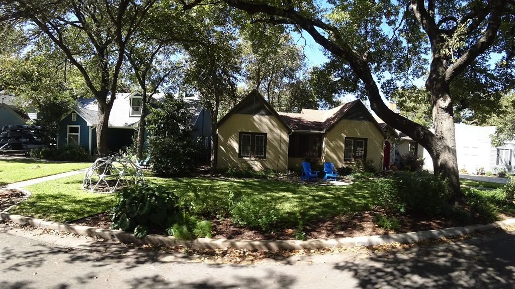 Street-level daytime example from Hyde Park Austin, cropped to show the local street context.