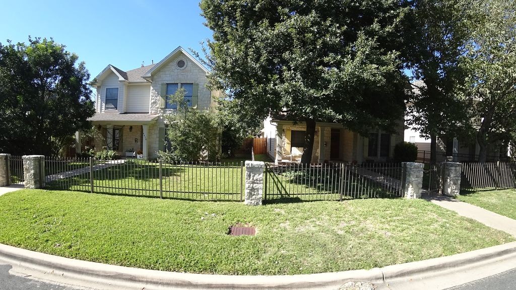 Street-level daytime example from Hyde Park Austin, cropped to show the local street context.