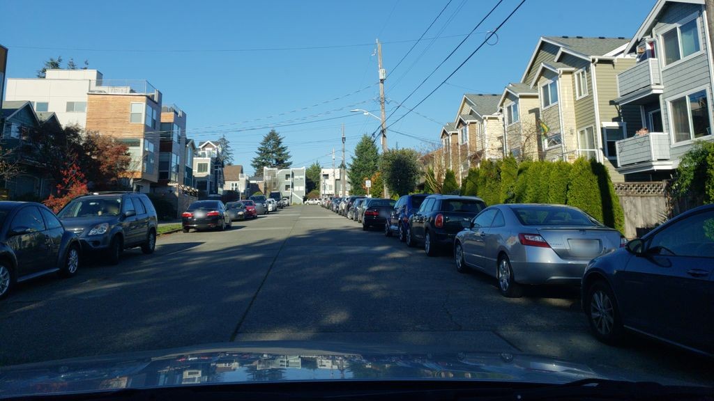 Street-level daytime example from North Seattle, cropped to show the local street context.