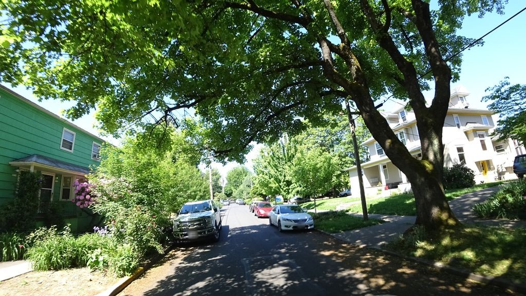 Street-level low light example from Portland Central Eastside, cropped to show the local street context.