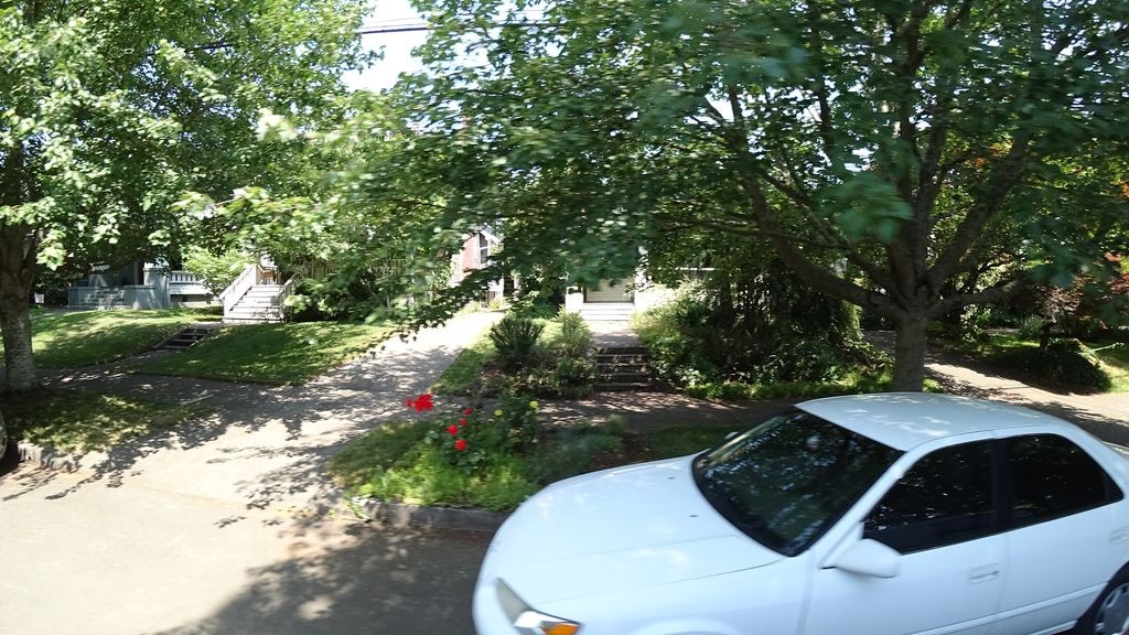 Street-level daytime example from Portland Hawthorne Division Belmont, cropped to show the local street context.