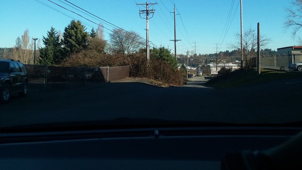 Street-level daytime example from Tacoma, cropped to show the local street context.