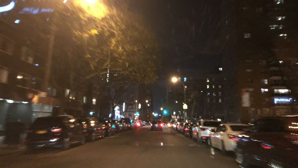 Street-level low light example from Upper West Side Nyc, cropped to show the local street context.