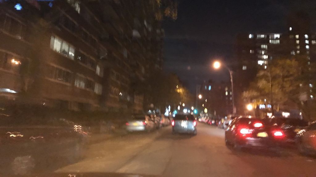 Street-level low light example from Upper West Side Nyc, cropped to show the local street context.