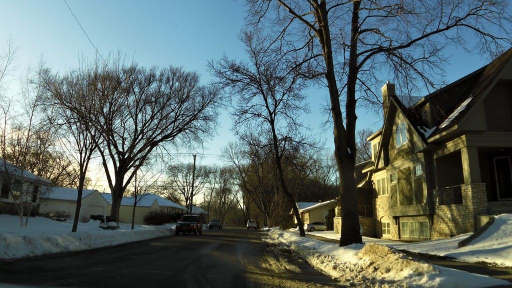 Street-level daytime example from Uptown Chain Of Lakes Minneapolis, cropped to show the local street context.