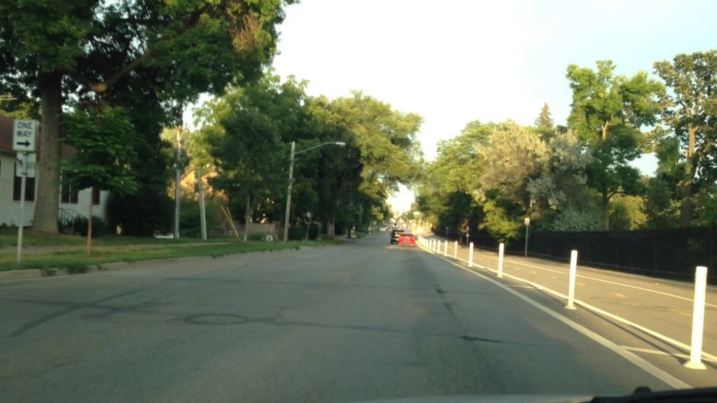 Street-level daytime example from Uptown Chain Of Lakes Minneapolis, cropped to show the local street context.