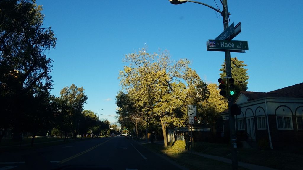 Street-level daytime example from Wash Park Denver, cropped to show the local street context.